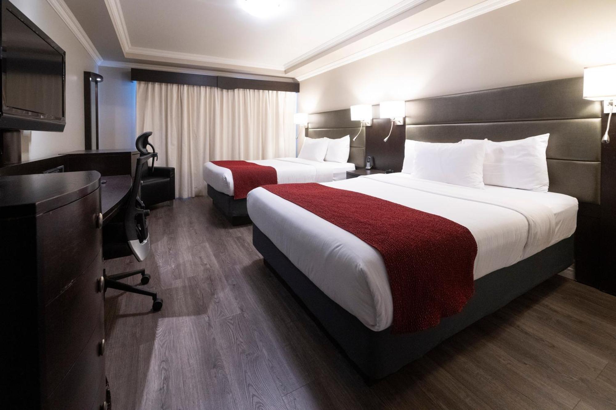 Hotel & Suites Le Dauphin Дръмондвил Екстериор снимка