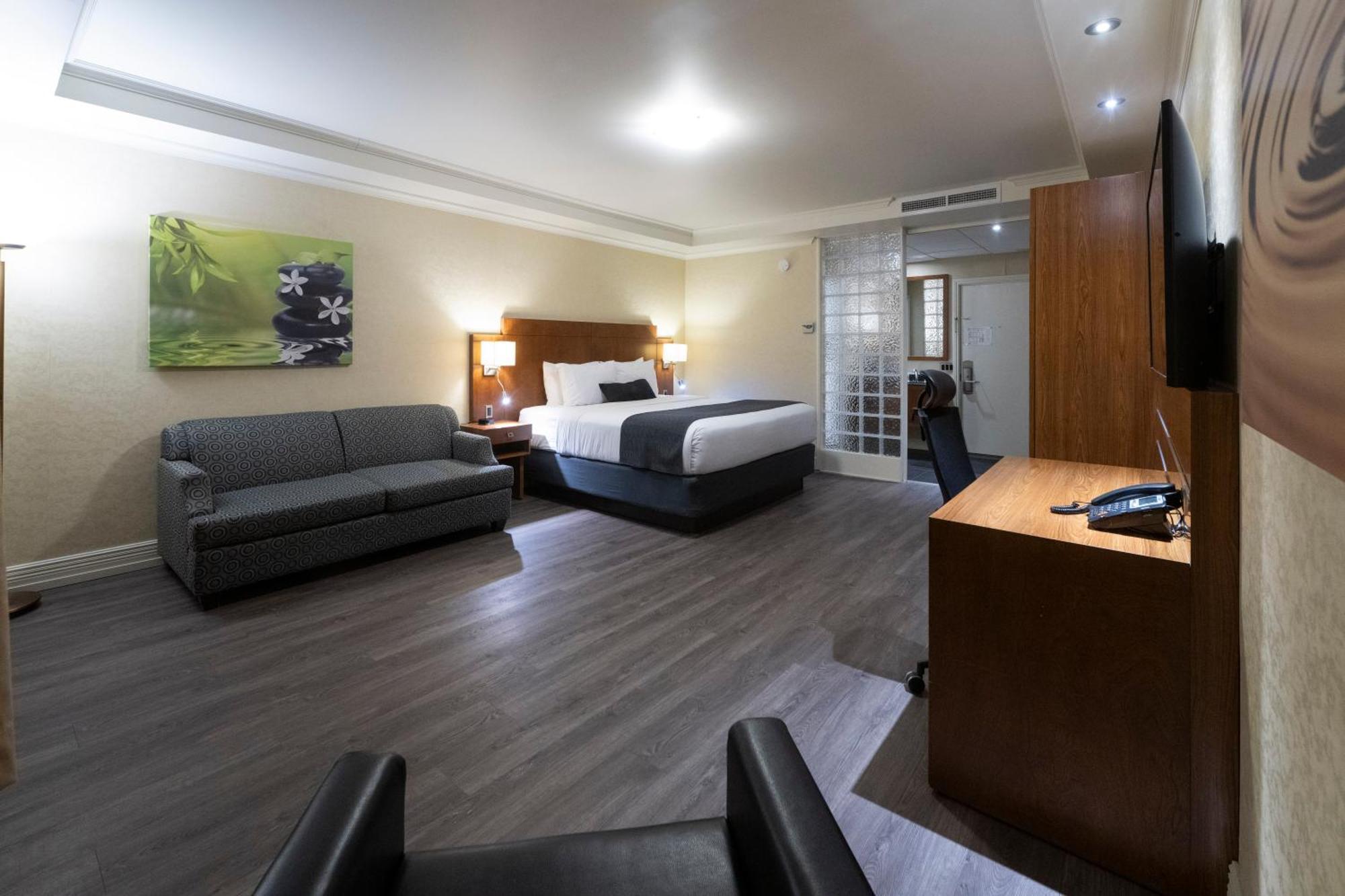 Hotel & Suites Le Dauphin Дръмондвил Екстериор снимка