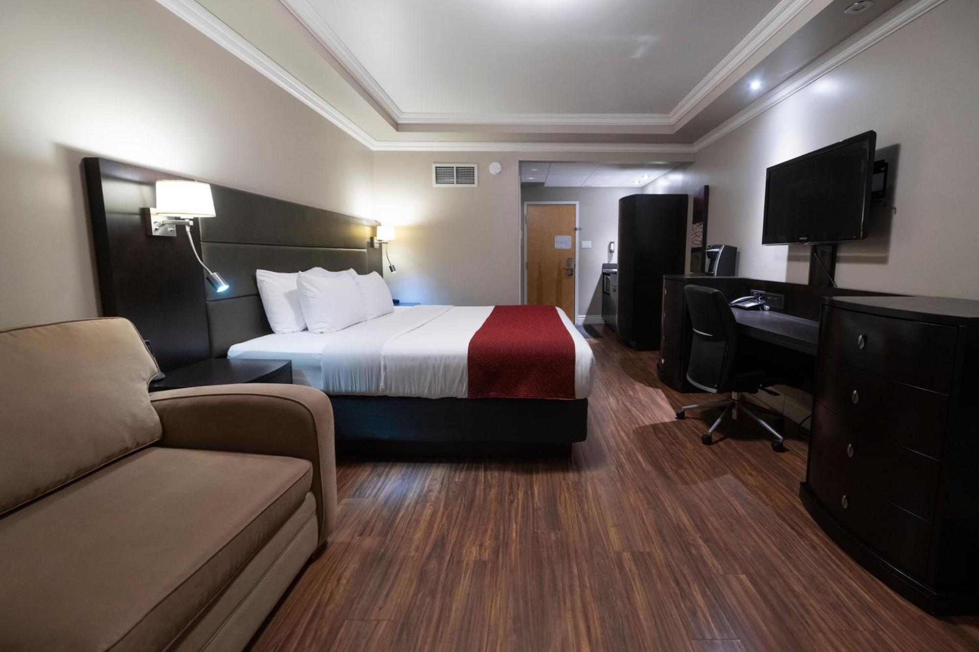 Hotel & Suites Le Dauphin Дръмондвил Екстериор снимка