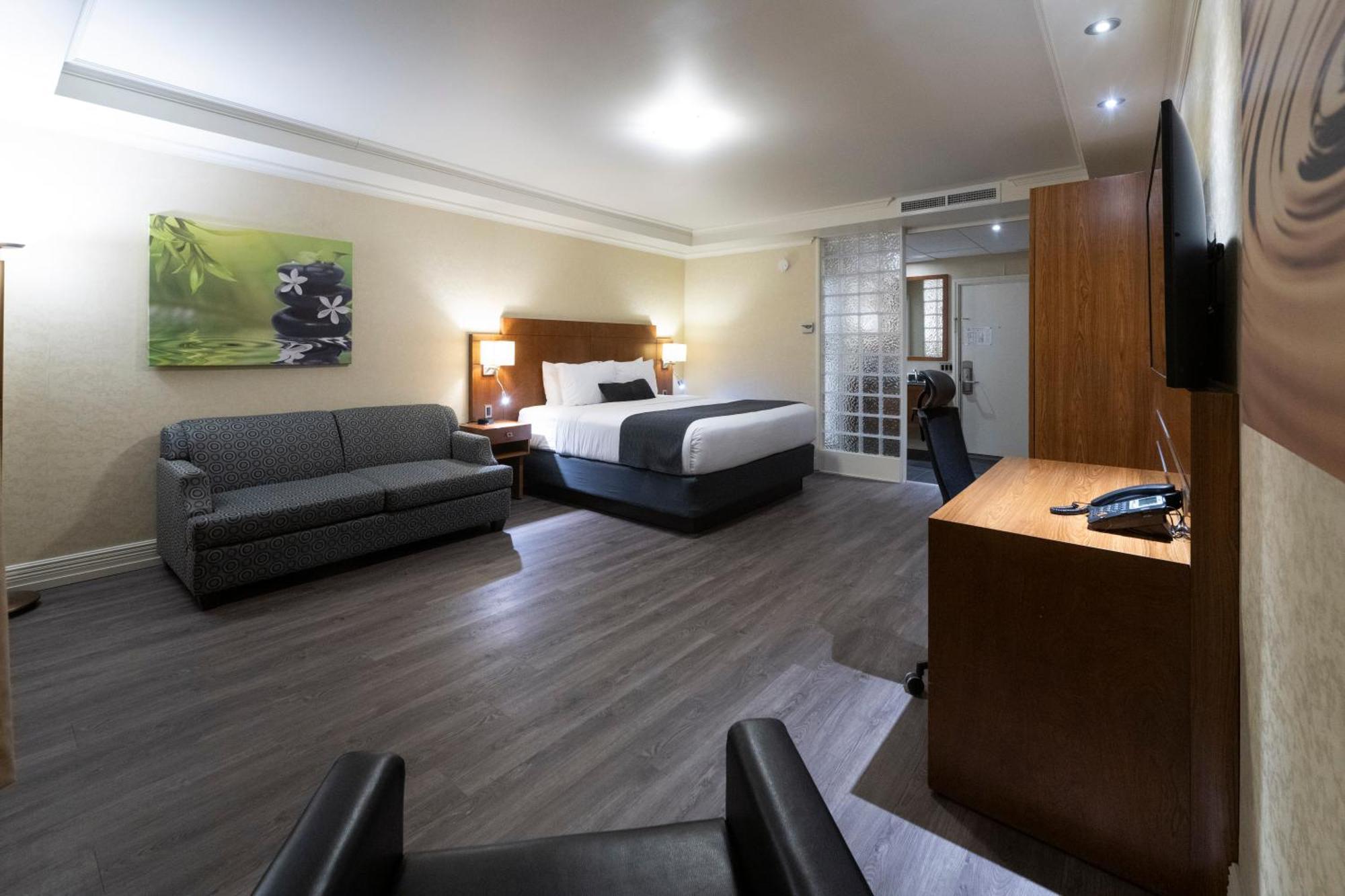 Hotel & Suites Le Dauphin Дръмондвил Екстериор снимка